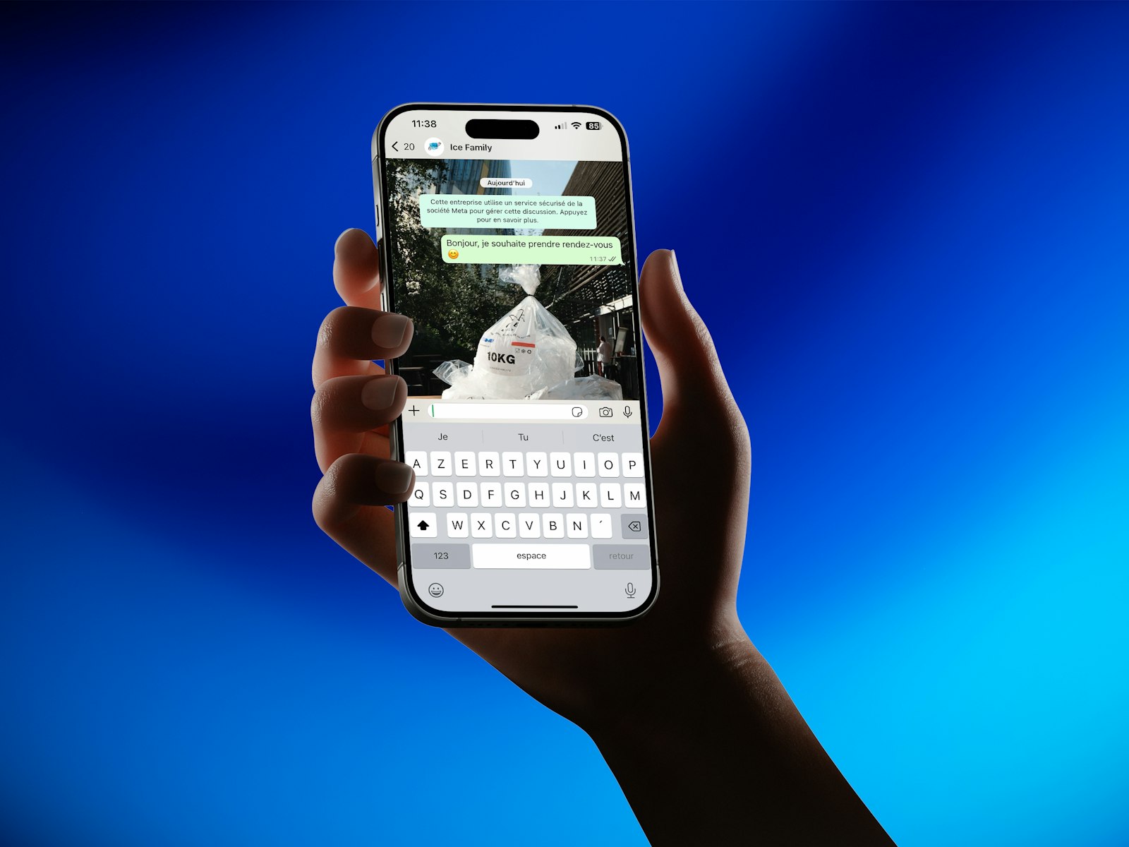 Hand holding a smartphone showing a messaging app — Photo by Ice Family on Unsplash