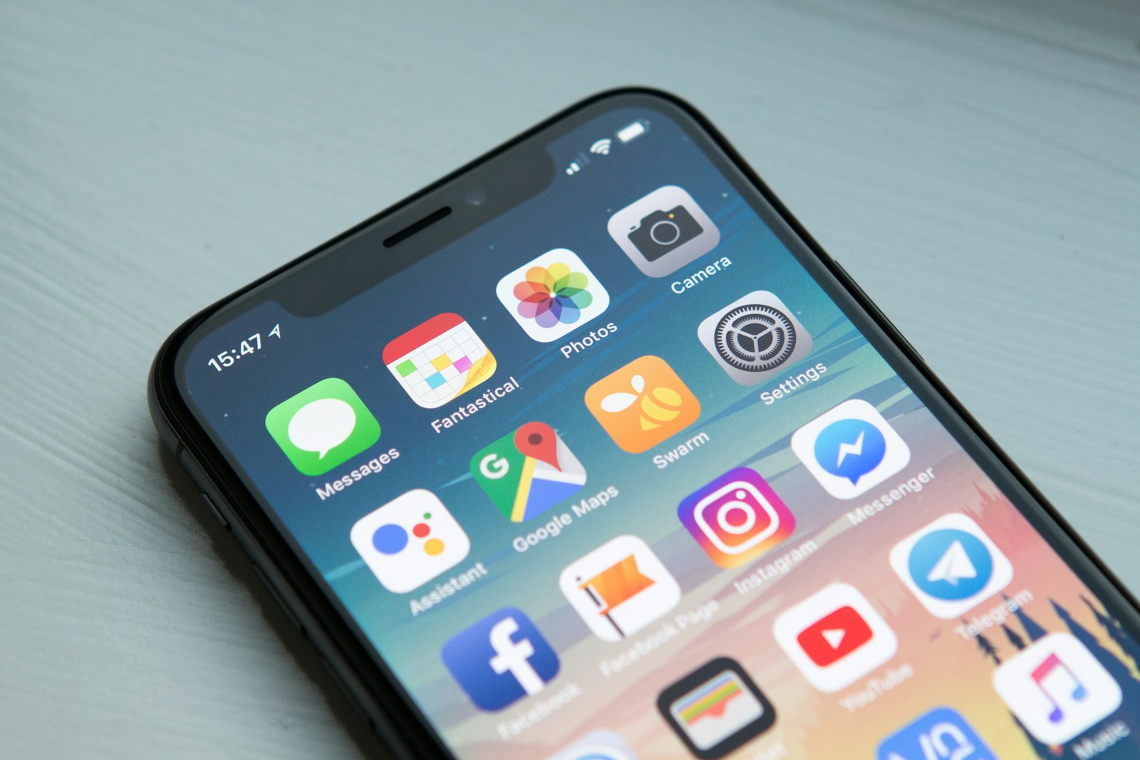 Person holding an iPhone — Photo on Unsplash